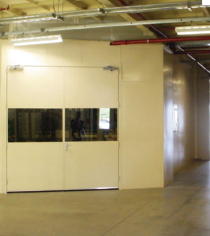 Small factory enclosure with a double door set.